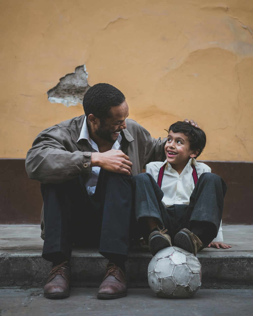 A mentor guiding a young athlete